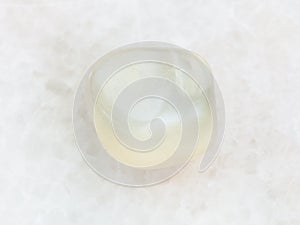 polished translucent moonstone gemstone on white