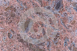 Polished volcanic basalt stone wall as texture