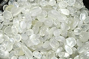 Polished white Moonstones (selenite) photo