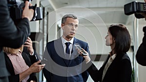 Politic man giving interview willingly