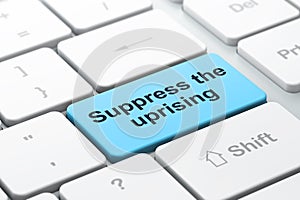 Political concept: Suppress The Uprising on computer keyboard background photo