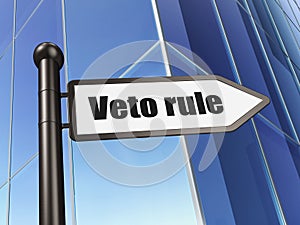 Political concept: sign Veto Rule on Building background