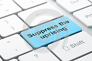 Political concept: Suppress The Uprising on computer keyboard background