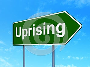 Political concept: Uprising on road sign background