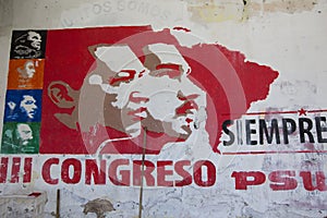 Political grapffiti of Hugo Chavez and Nicolas Maduro on a wall