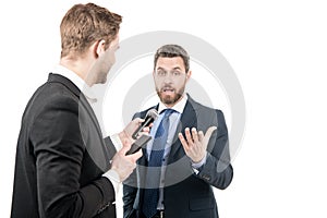 Political news. Journalist interviewing politician. Journalistic interview. Media interview