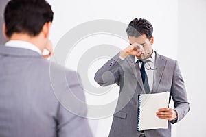 The politician planning speach in front of mirror