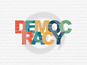 Politics concept: Democracy on wall background