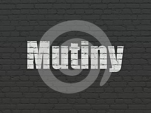 Politics concept: Mutiny on wall background