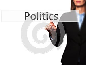 Politics - Isolated female hand touching or pointing to button