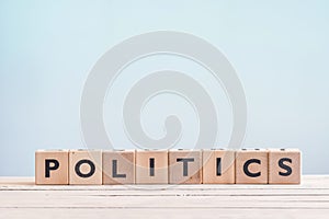 Politics sign made of wooden cubes