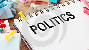 POLITICS word on paper with office tools