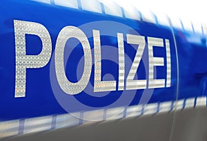 Polizei sign on a german police car photo