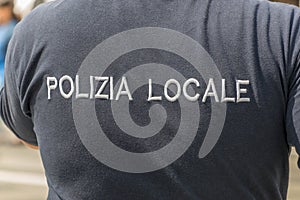 Polizia locale territorial police force in Italy sign on t-shirt. photo