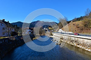 Poljanska Sora river flowing trough Gorenja Vas village