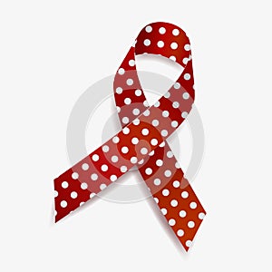 The polka dot awareness ribbon is used to represent those who are suffering from blindness. Isolated on white background