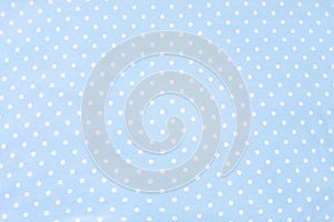 Polka dot blue fabric background and texture. Wallpaper, card, cover design and decor