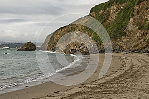 Polkerris Beach and cliffs, Cornwall, England photo