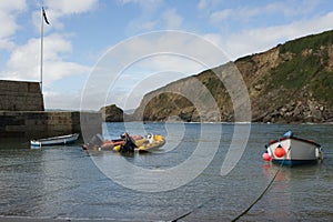 Boats at Polkerris Beach, Cornwall, England photo