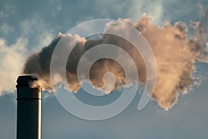 Pollutants from factory chimneys fall down to earth