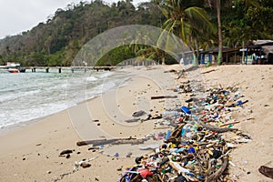 Polluted beach - plastic waste, trash and garbage on beach