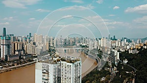 Polluted Chinese Yangtze river, Chongqing city landscape, and urban skylines, Chinese city aerial