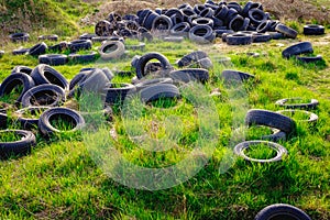 Polluted environment with old used car tyres