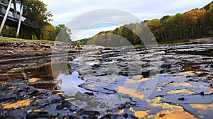 Polluted river with oil slicks on the water\'s surface photo