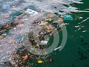 Polluted sea waters. Pollution in water. Plastic bottles. Diseases and illnesses