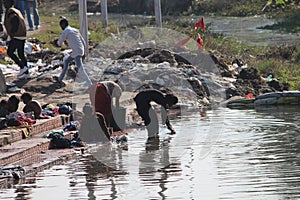 a polluted stream in a village