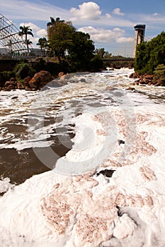 Polluted Tiete river in Salto city - Watterfall turistc complex park photo