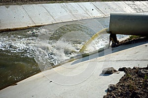 Polluted water overflow into the river