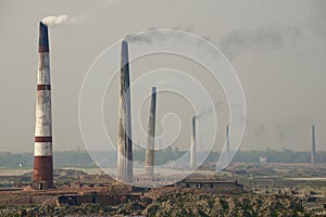 Polluting air brick factories pipes at Dhaka, Bangladesh.