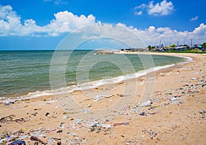 Pollution on the beach of tropical sea.