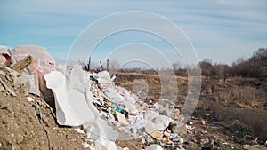 Pollution concept. Garbage pile in trash dump or landfill. Global damage environmental. Construction debris. Slow motion.