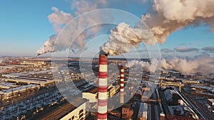 Pollution of the environment: a pipe with smoke. Aerial view