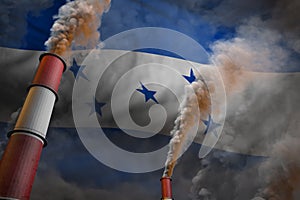 Pollution fight in Honduras concept - industrial 3D illustration of two huge industry pipes with dense smoke on flag background