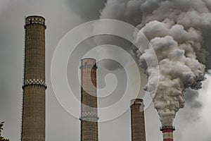 pollution, furnace inside a chemical plant, brown and white coal power plant emission.