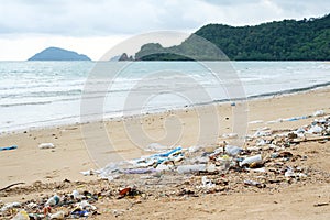 Garbages, plastic, and wastes on the beach