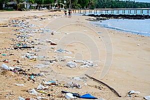 Pollution: plastic and wastes on the beach