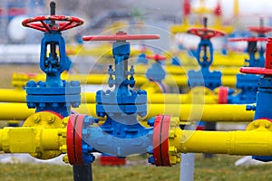 Poltava, Ukraine - February 3, 2023: Pipes, taps and a valve for shutting off gas supply at a gas compressor station