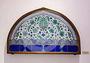 A polychrome lunette of glazed tiles from Iznik