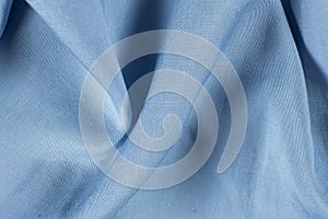 Polyester fabric with a little elastane, macro texture top view.