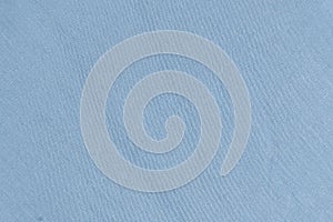 Polyester fabric with a little elastane, macro texture top view.