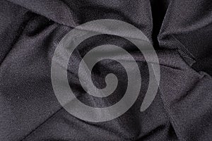 Polyester fabric with a little elastane, macro texture top view.