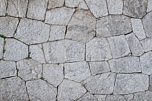 Polygonal masonry of grey limestone