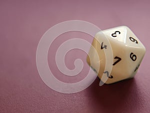 Polyhedron, dice with numbers on a colored background