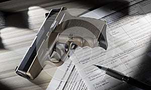 Polymer pistol on the publlic domain paperwork required by the FBI to purchase a handgun