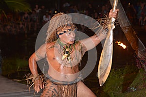 Polynesian Cook Islander man dance in cultural performance in Ra