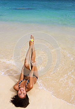 Polynesian girl in a black bikini